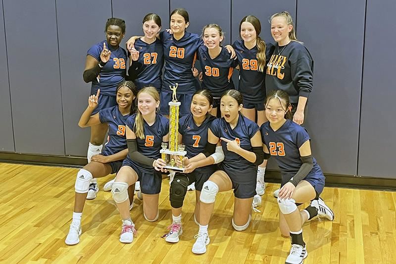 The Sprague Middle School 7A volleyball team poses after defeating Salyards Middle School to win the district championship.